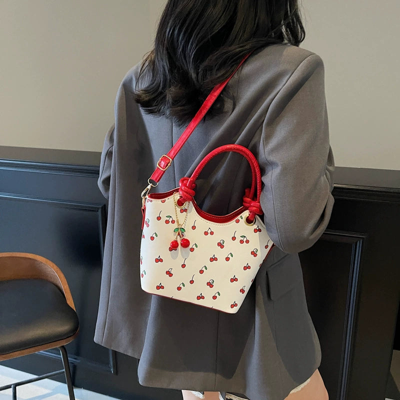 Cherry Pattern Bucket Bag - Women's Handbag with Detachable Cherry Charm & Convertible Shoulder Strap