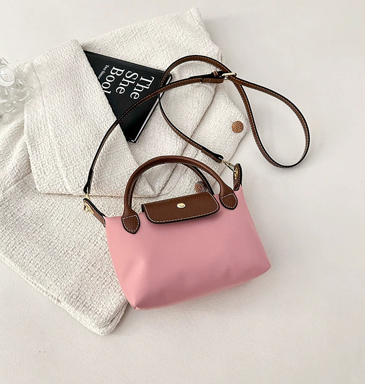 Nylon Crossbody Bag with Brown Leather Trim - Compact Foldable Handbag with Adjustable Strap