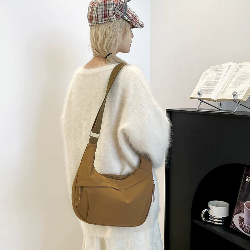 Hip Hugger Unisex Iris Bag - Sage Green Crossbody with Adjustable Strap & Modern Curved Design