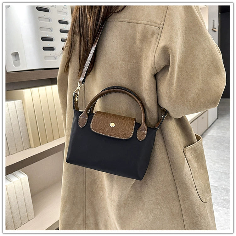 Nylon Crossbody Bag with Brown Leather Trim - Compact Foldable Handbag with Adjustable Strap