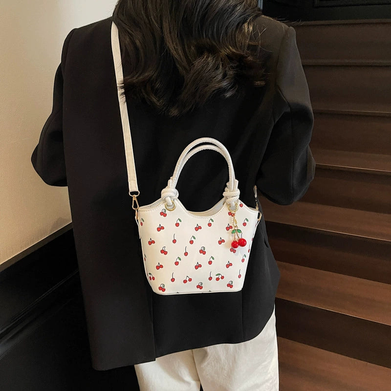 Cherry Pattern Bucket Bag - Women's Handbag with Detachable Cherry Charm & Convertible Shoulder Strap